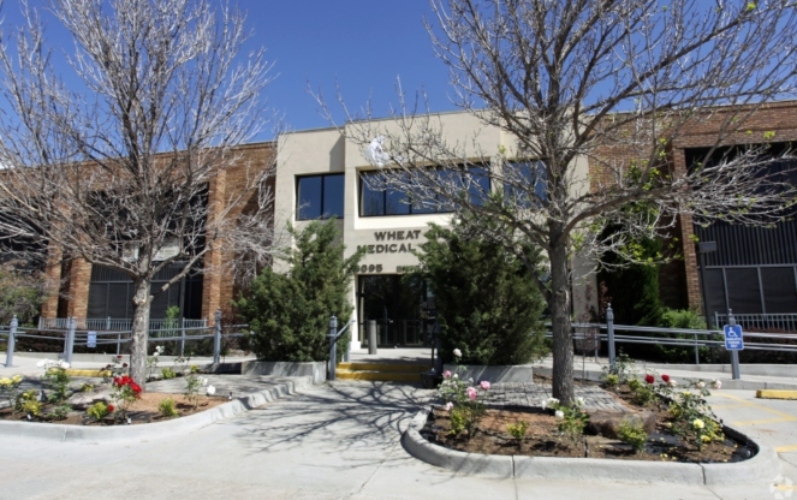 Photo of commercial real estate office building with space for lease at 3885-3895 Upham St in Wheat Ridge, CO.